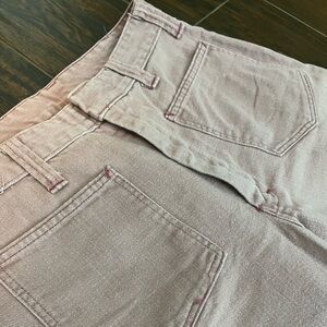 Vintage mauve bell bottoms with floral detail